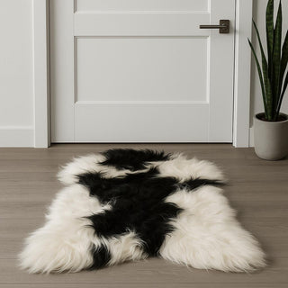 Home Outfitters 2' X 3' Black and White Spotted Sheepskin Handmade Area Rug