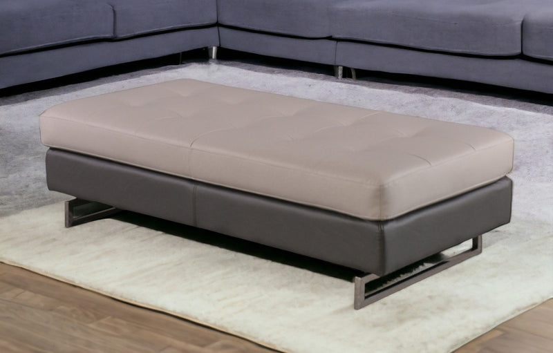 Home Outfitters 63" Taupe Faux Leather And Silver Ottoman