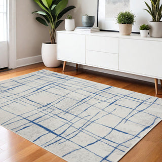 Home Outfitters 4' X 6' Ivory And Blue Geometric Distressed Area Rug
