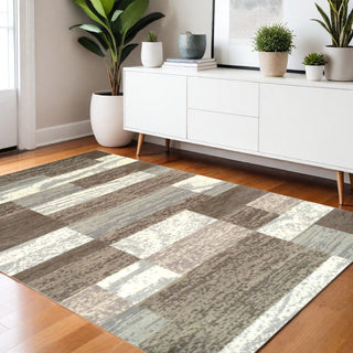 Home Outfitters 4' X 6' Light Blue And Ivory Patchwork Power Loom Stain Resistant Area Rug