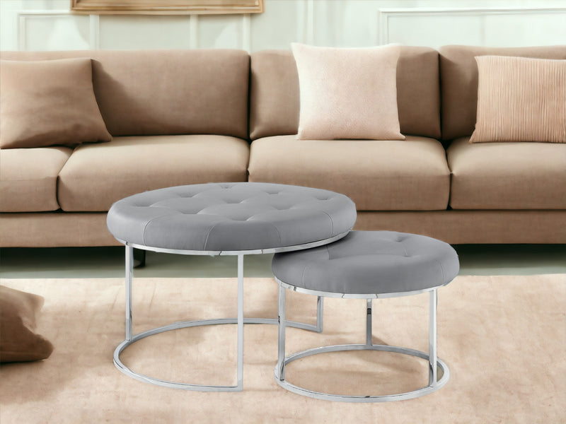 Home Outfitters Set of Two Gray Faux Leather and Silver Tufted Round Ottomans