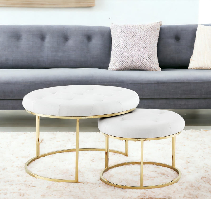 Home Outfitters Set of Two White Faux Leather and Gold Tufted Round Ottomans