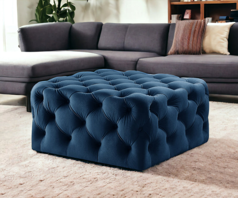 Home Outfitters 33" Navy Blue Velvet Rolling Tufted Cocktail Ottoman