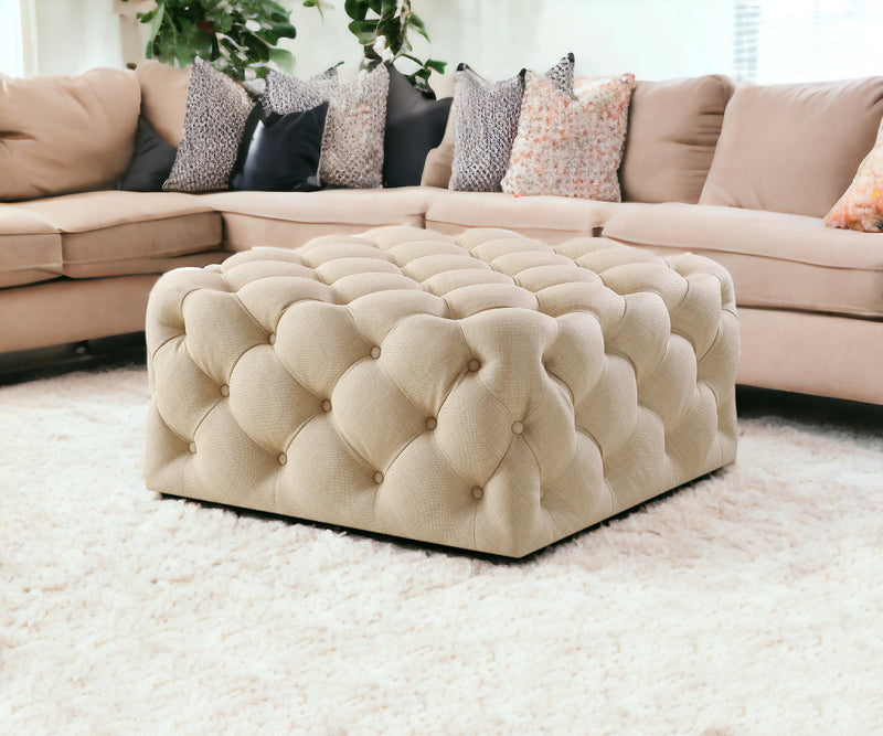 Home Outfitters 33" Beige Linen Rolling Tufted Cocktail Ottoman