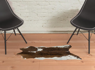 Home Outfitters 2' X 3' Brown and White Cowhide Hand Tufted Area Rug