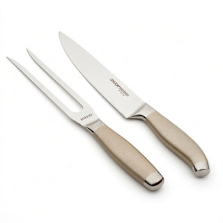 A stainless steel carving knife and fork with wooden handles, lying against a white background.